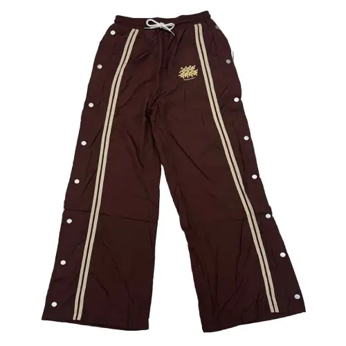 Project Capri Running Man Track Pants Brown front view with signature graphic detail